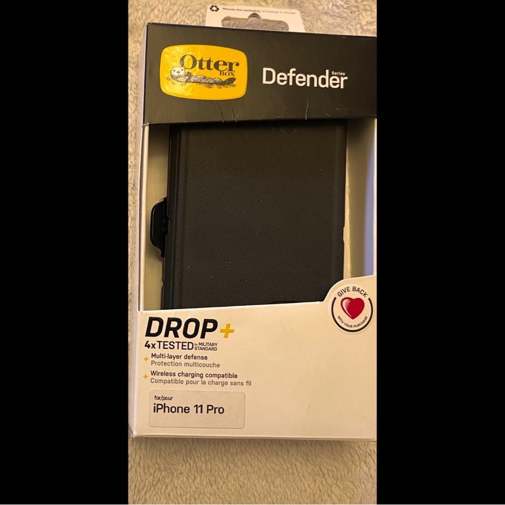 Black i phone 11 pro Otter box.